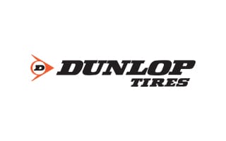Dunlop Tires logo featuring bold lettering and an orange and black design element.